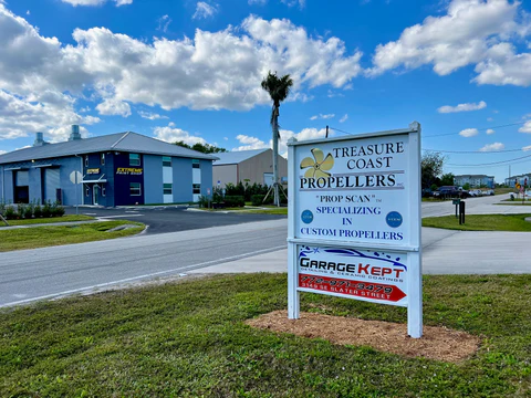 Garage Kept Detailing shop sign next to Treasure Coast Propellers in Stuart, FL