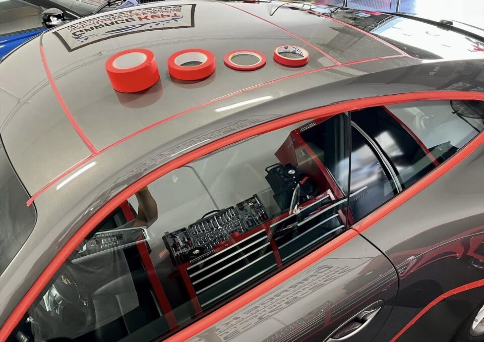 Paint correction prep on a vehicle showing oxidation and swirl marks