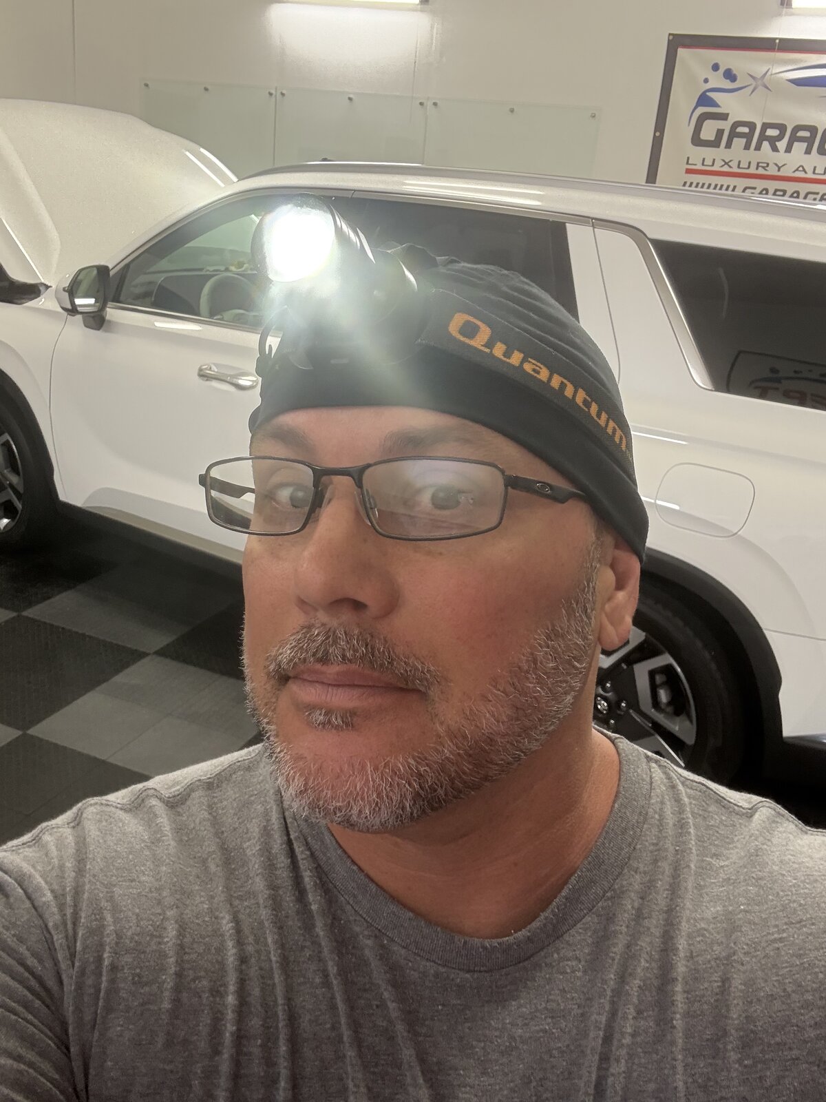 Shawn, owner of Garage Kept Detailing, in the Stuart, FL shop